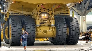 Moving a massive Caterpillar 794AC dump truck [upl. by Alyk]