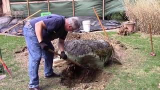 Moving a big rock with a hand truck a lawn tractor and a willing wife [upl. by Joed15]