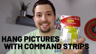 How To Hang Pictures with Command Strips [upl. by Ainerbas673]