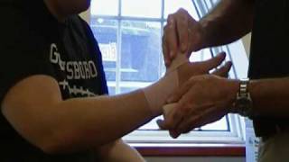 How To Wrap An Elastic Bandage Thumb Sprain [upl. by Salisbarry]