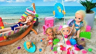 Annia and Elsia Toddlers Play in the Sand Swim at the Beach with Barbie and Chelsea Toys and Dolls [upl. by Aryn]